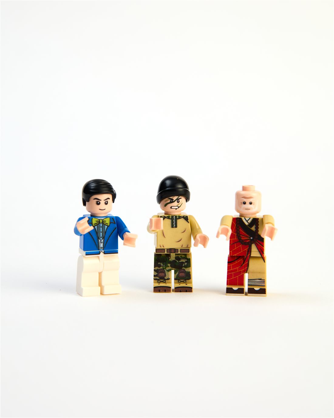 Three minifigs standing together