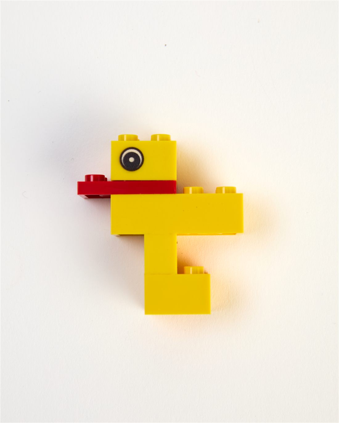 A yellow duck built from six bricks